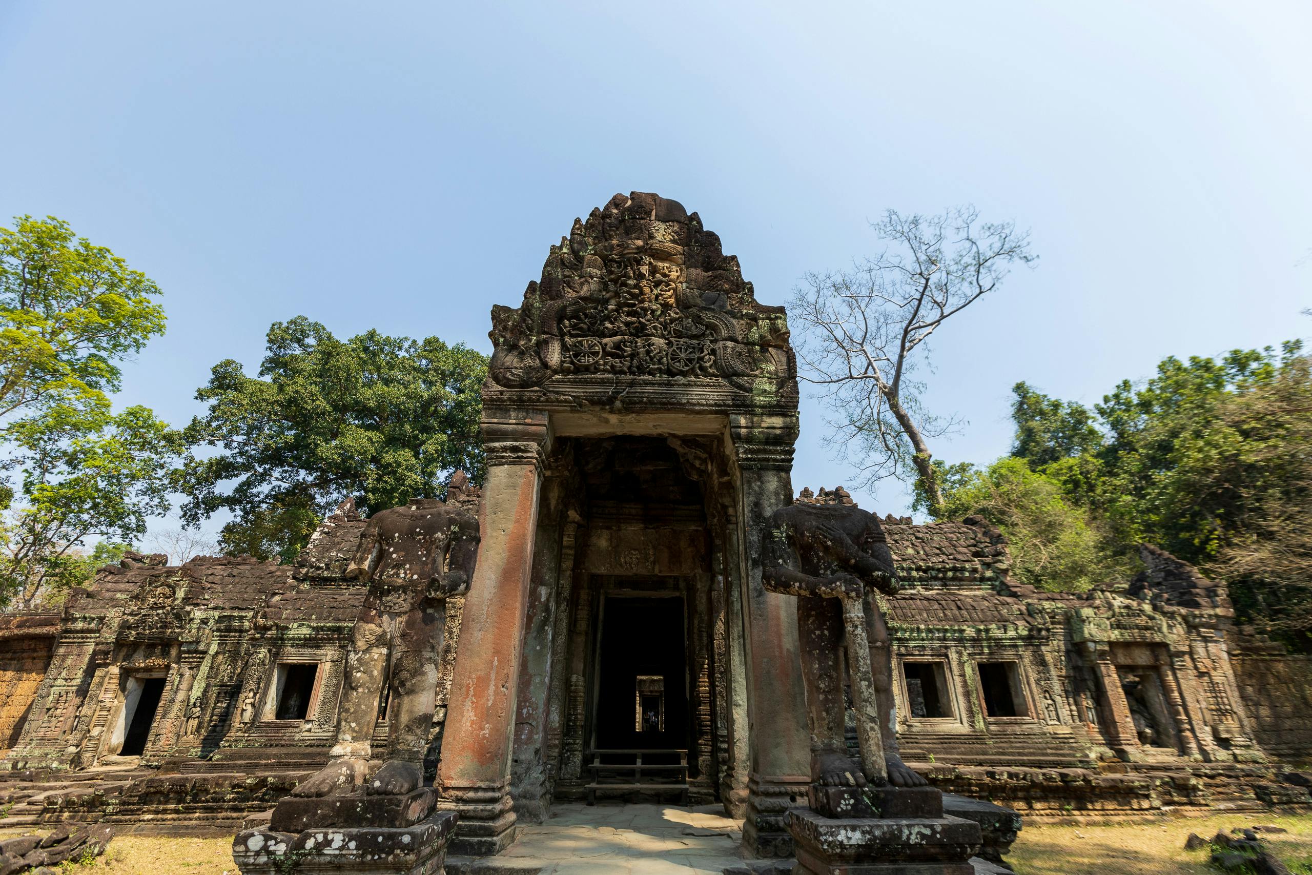 Explore the ancient ruins of Preah Khan Temple, a historic Buddhist site in Cambodia's Angkor Wat complex.