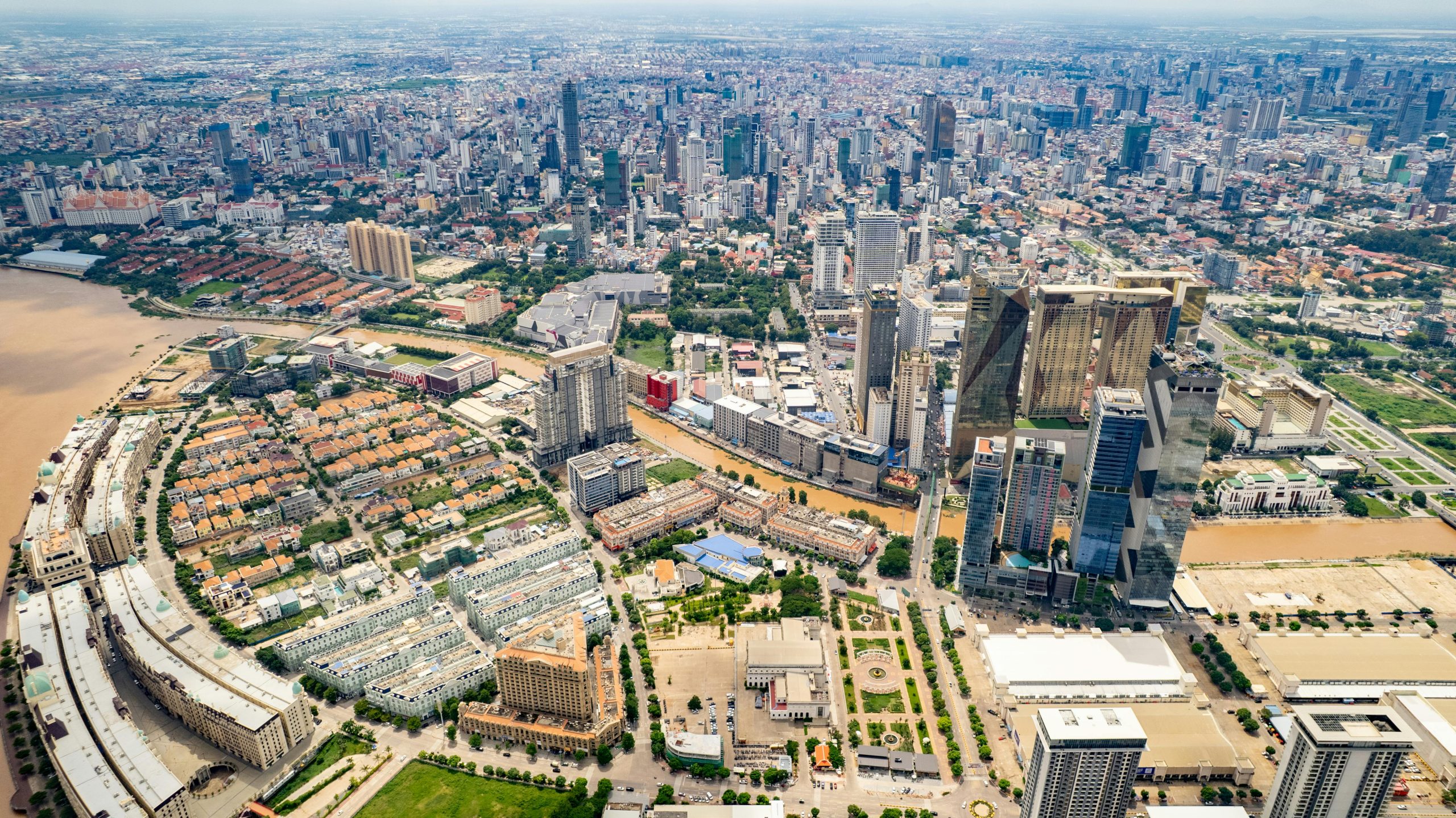 Breathtaking aerial shot of Phnom Penh's modern skyline and bustling urban landscape.